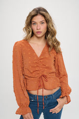 V-NECK CINCHED TEXTURED DOT BLOUSE